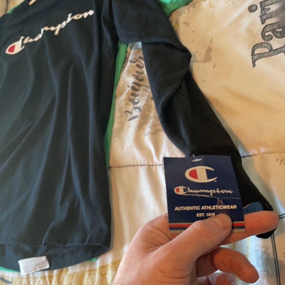 Champion - Picture 2 of 2